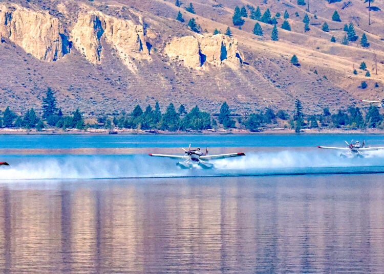 An Air Tractor AT-802F flight group can quickly respond over a fire to drop continuous loads of water, slow its growth, reduce its intensity, and remain on scene until the fire is extinguished.